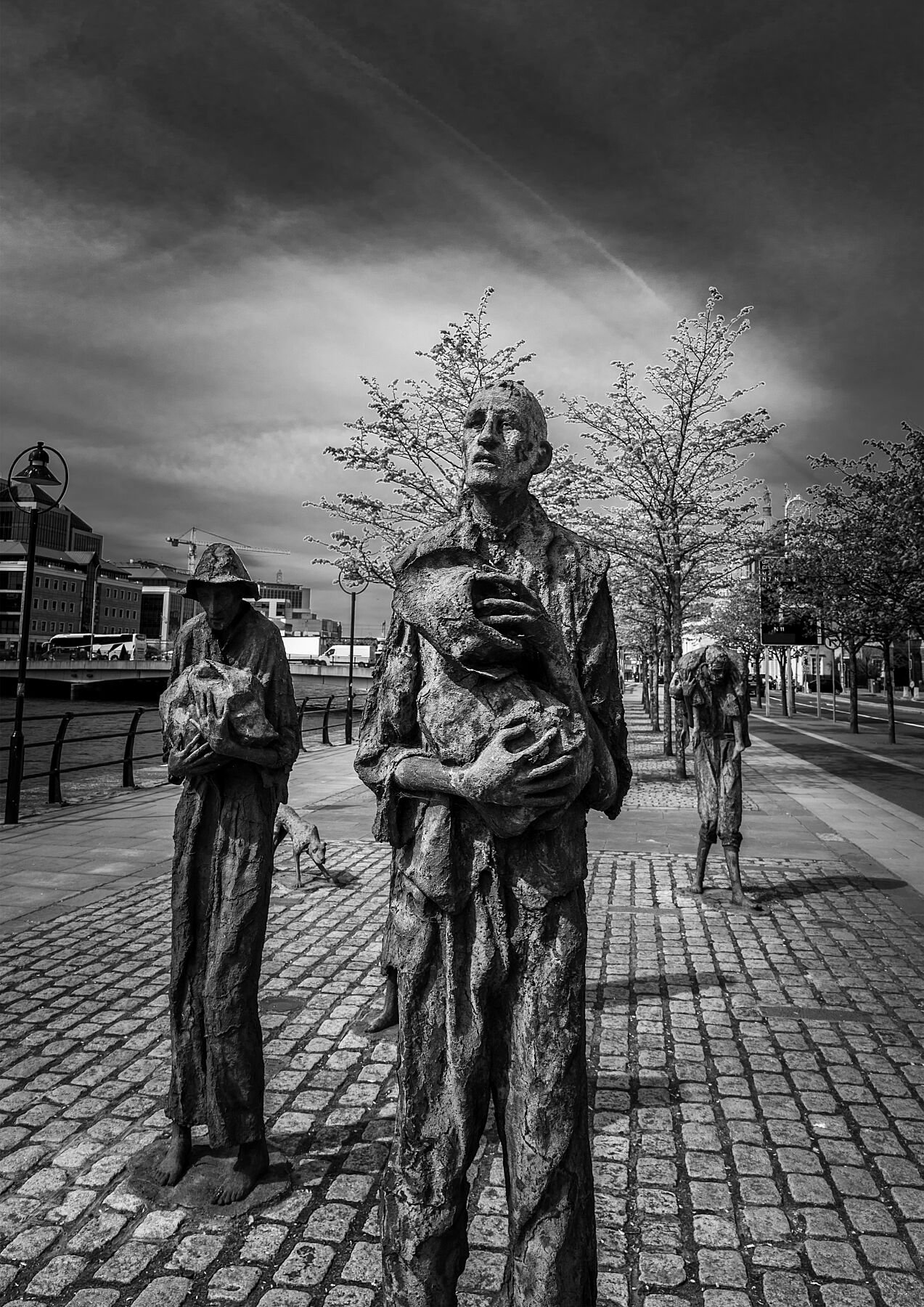 The Walking Famine fine art print — Dublin Famine Memorial bronze statues Custom House Quay black and white