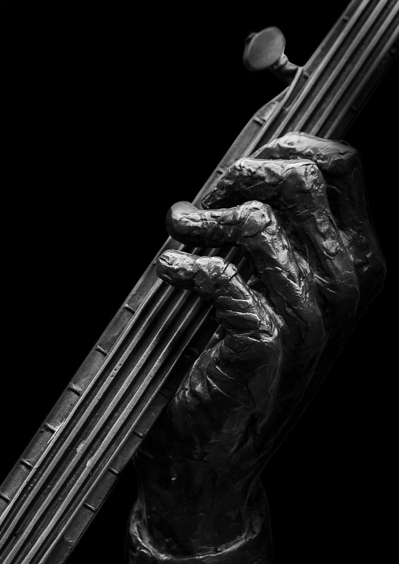 The Grip of the Old Tune fine art print — bronze musician hands on instrument strings black and white Dublin